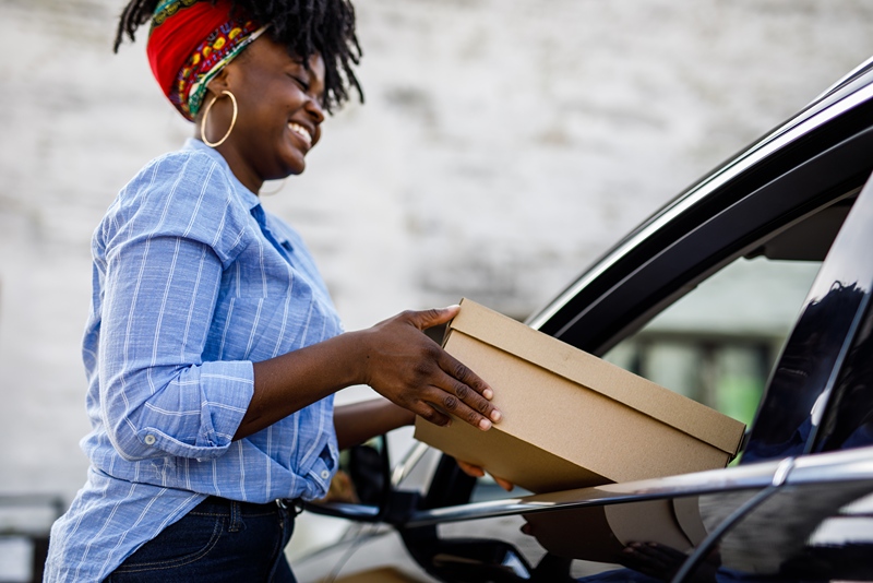 woman delivering item