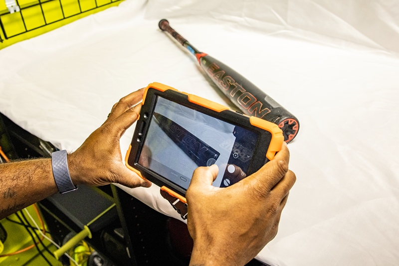 Talking picture of baseball bat on tablet